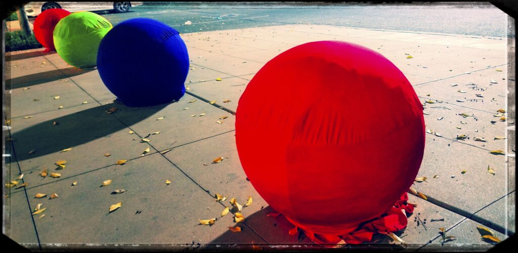colourful cloth balls on a street