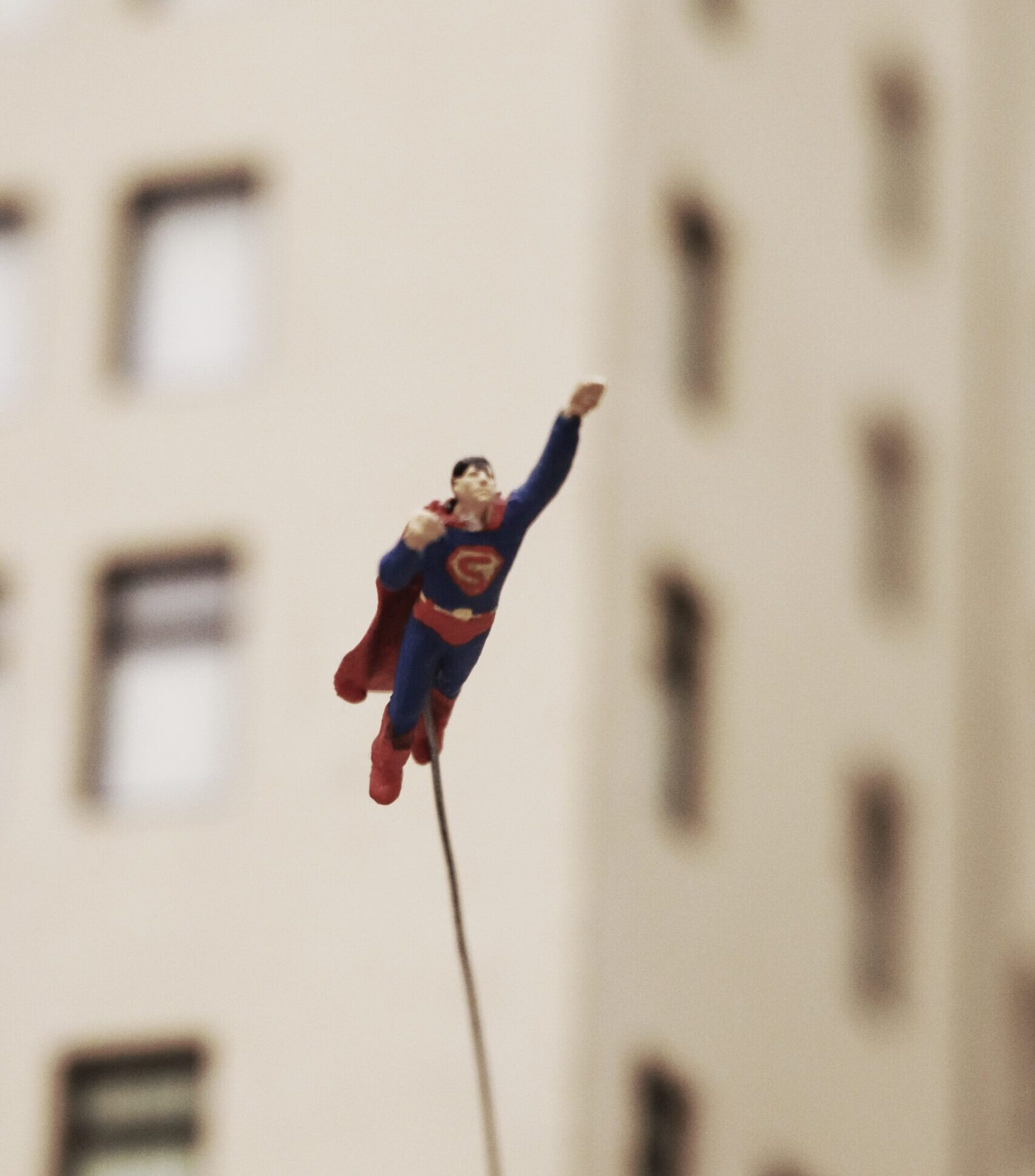 Figure of Superman flying through the air
