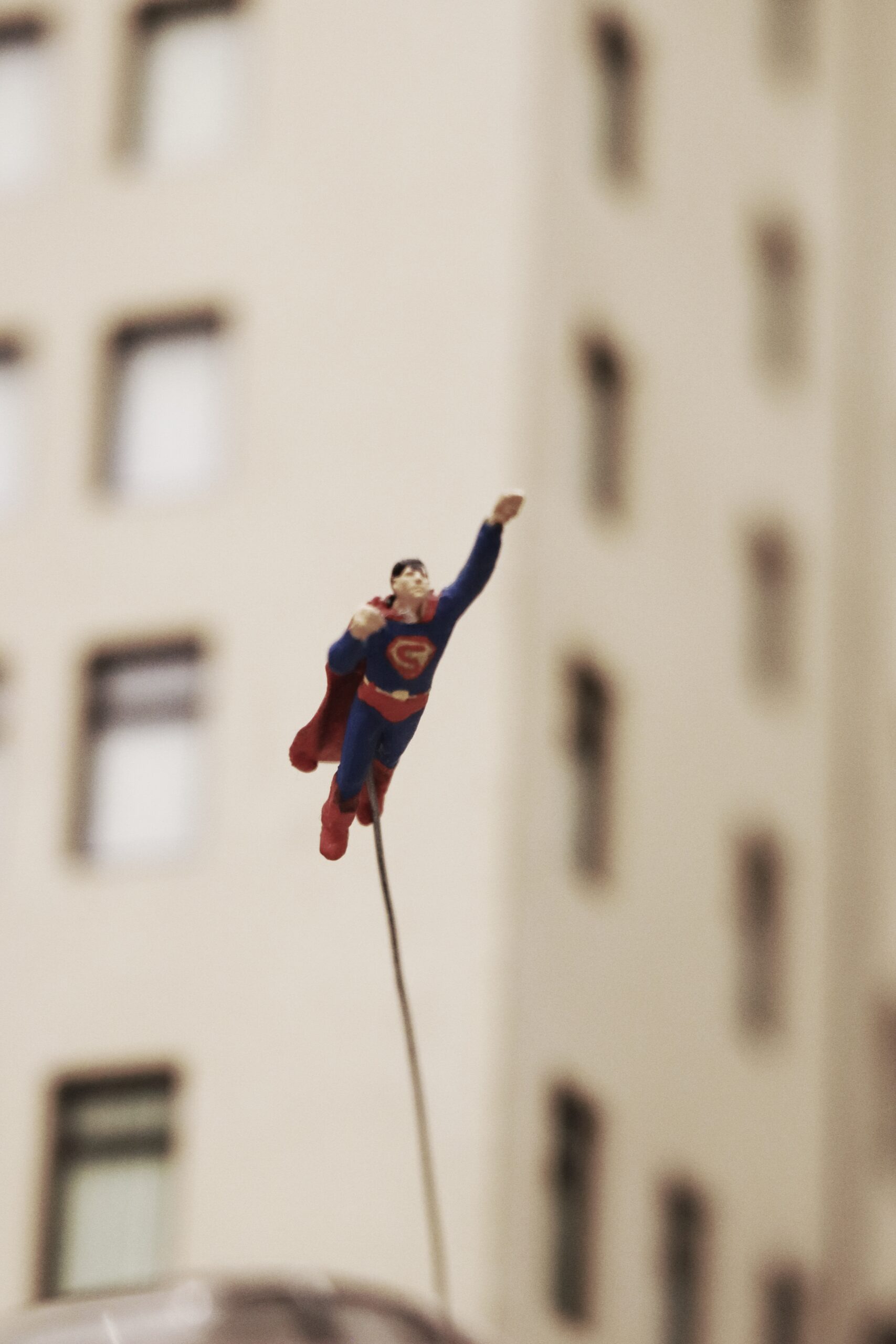 Figure of Superman flying through the air